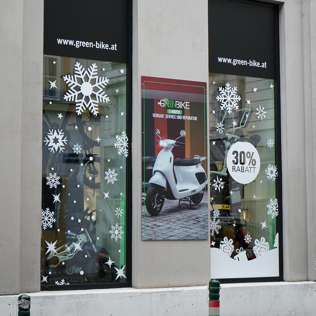 Schaufenster mit Winterdekoration und UV-Schutz Fensterfolie mit Rabattangebot von Buntheit